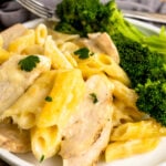 Close Chicken Alfredo Bake with broccoli and a fork.