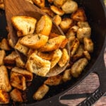 Homemade croutons served on a wooden spoon.