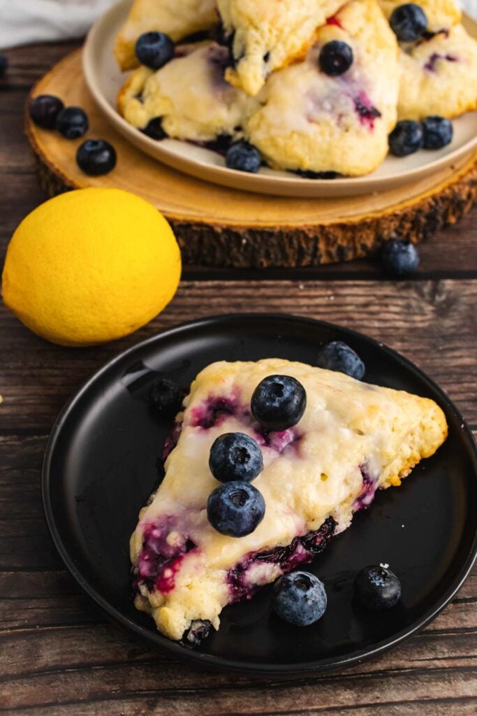 Blueberry scones flavored with fresh lemon juice and a sweet glaze.