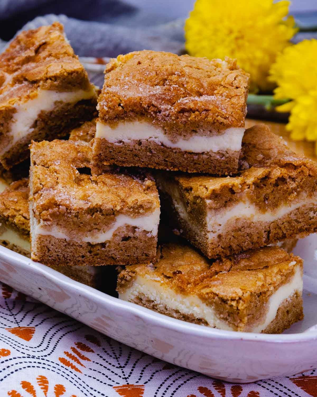 Snickerdoodle Cheesecake Bars are so sweet and the perfect induldgent treat to serve at any occasion.