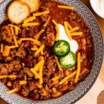 Jalapeños, cheese, and sour cream topping Bloody Mary Chili.