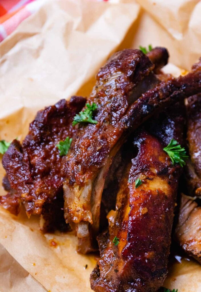 Bone in Crock Pot Country Style Ribs served with sauce just like your favorite BBQ joint.