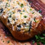 Loaf of spinach artichoke stuffed bread.