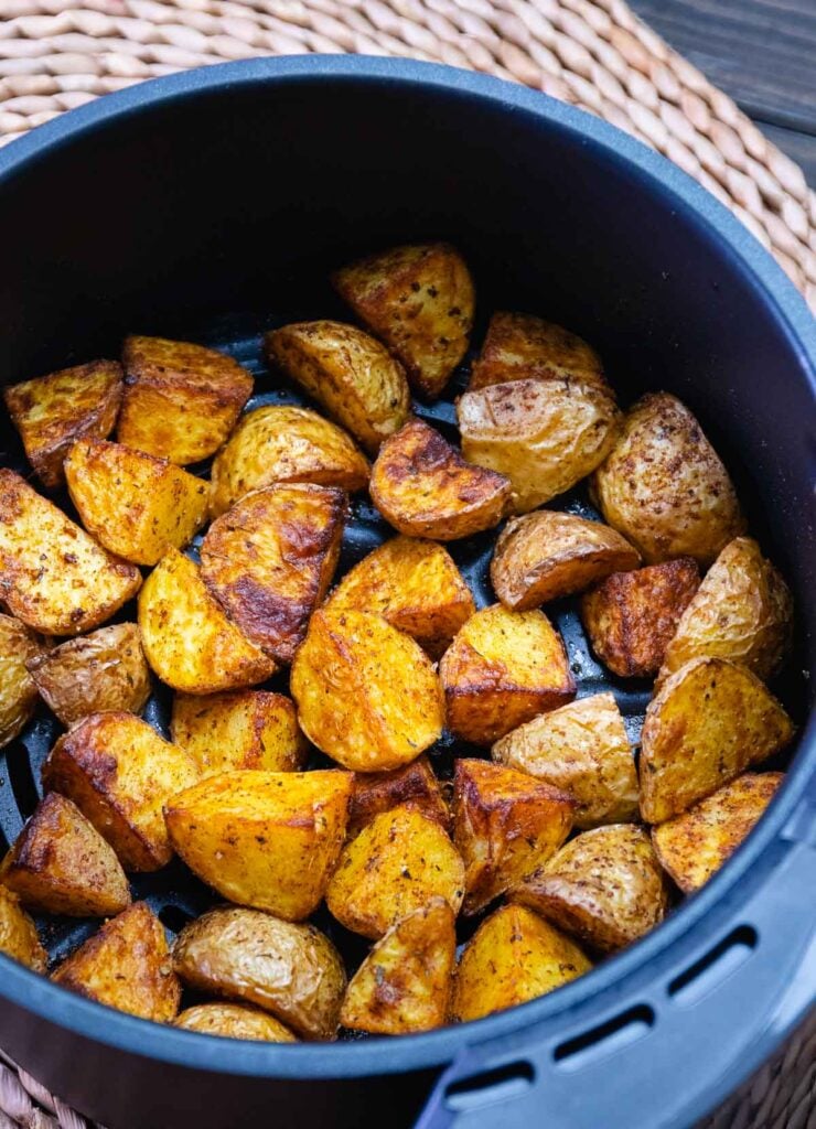 Cajun potatoes cooked in the air fryer until golden and crispy.