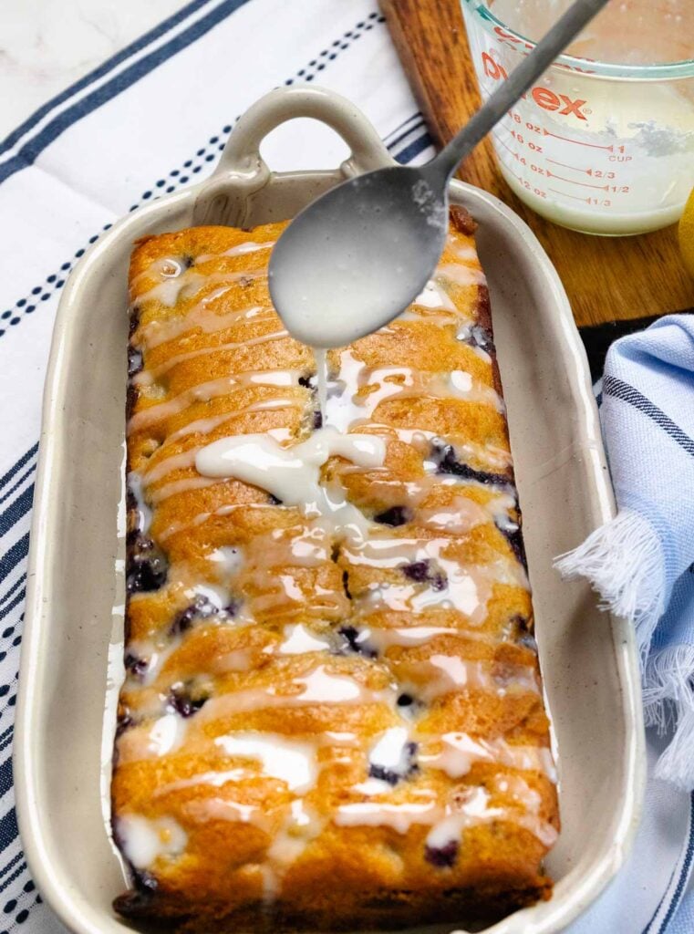Blueberry bread drizzled with lemon glaze.