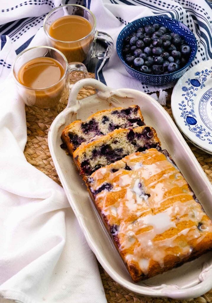Blueverry bread with lemon glaze served with coffee.