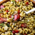 Pesto Pasta Salad with tomatoes and mozzarella cheese is easy to make and delicious.
