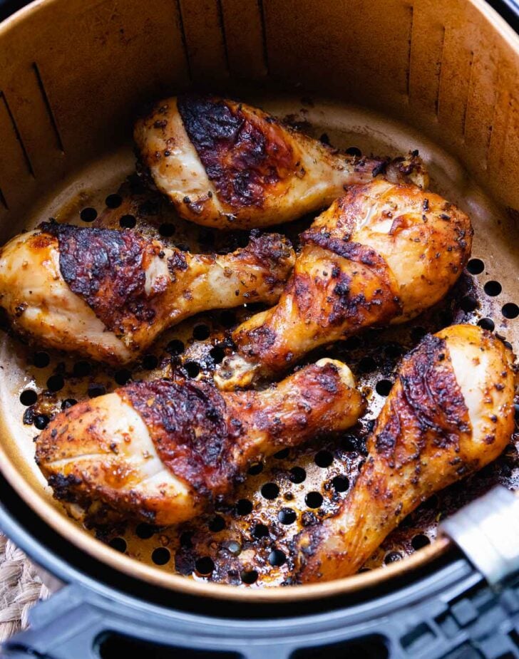 Air Fryer Chicken Legs (Drumsticks) are so delcious flavored with lemon pepper, paprika, garlic powder. Roasted to perfection in just 20 minutes, this is a great, inexpensive weeknight main dish and perfect for feeding a crowd.