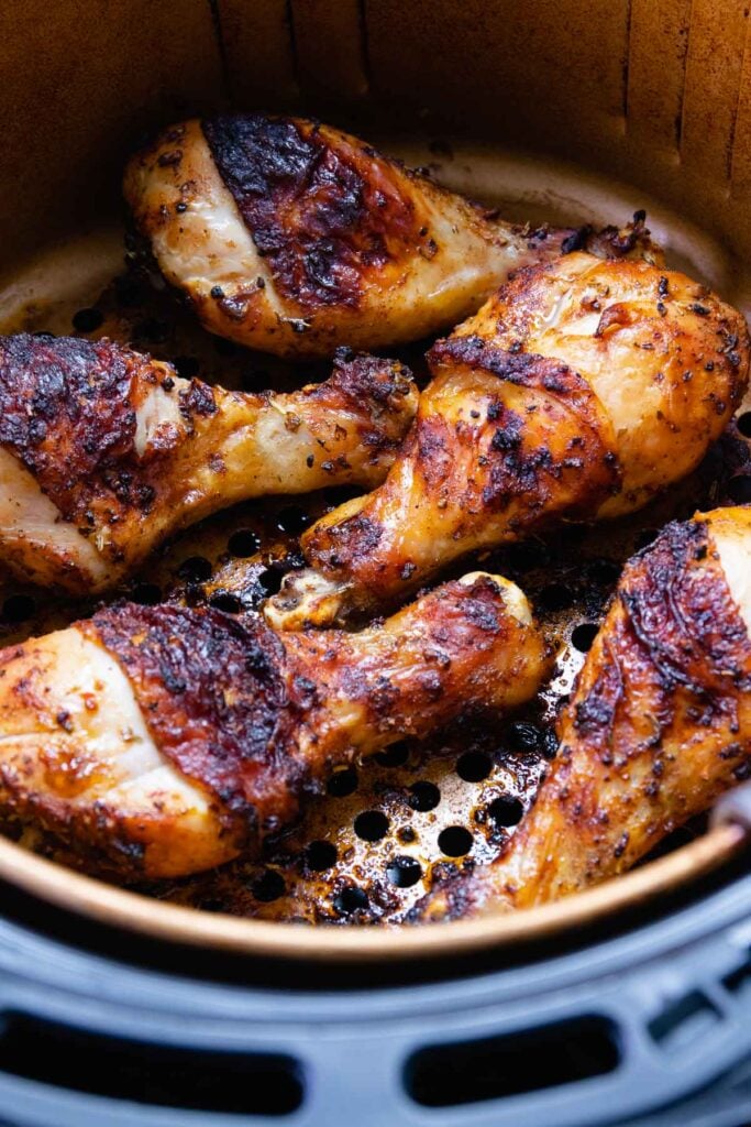 Air Fryer Chicken Legs (Drumsticks) are so delcious flavored with lemon pepper, paprika, garlic powder. Roasted to perfection in just 20 minutes, this is a great, inexpensive weeknight main dish and perfect for feeding a crowd.