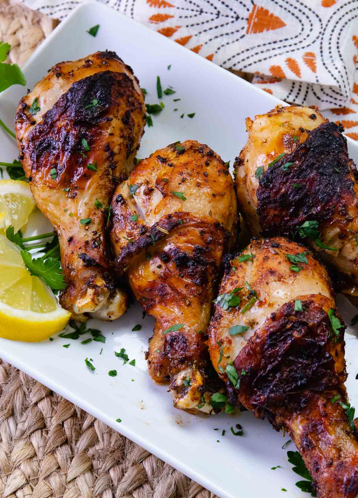 Air Fryer Chicken Legs (Drumsticks) are so delcious flavored with lemon pepper, paprika, garlic powder. Roasted to perfection in just 20 minutes, this is a great, inexpensive weeknight main dish and perfect for feeding a crowd.