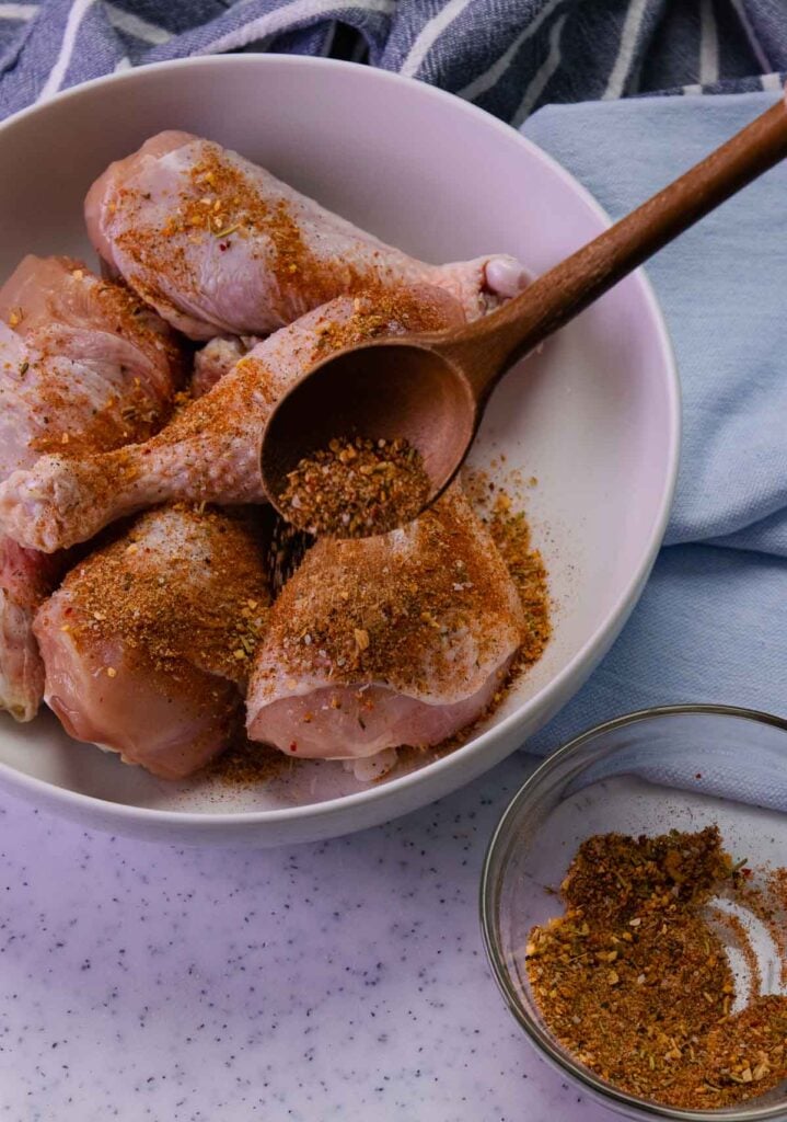Air Fryer Chicken Legs (Drumsticks) are so delcious flavored with lemon pepper, paprika, garlic powder. Roasted to perfection in just 20 minutes, this is a great, inexpensive weeknight main dish and perfect for feeding a crowd.