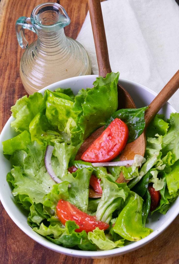 Everyday Green Salad is fresh, easy to make, with tomatoes, lettuce and onion. It's the best recipe that's simple and delicious.