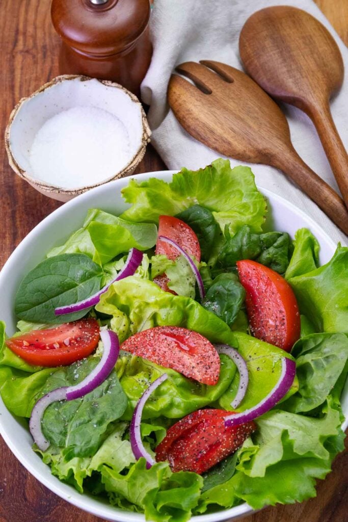 Everyday Green Salad is fresh, easy to make, with tomatoes, lettuce and onion. It's the best recipe that's simple and delicious.
