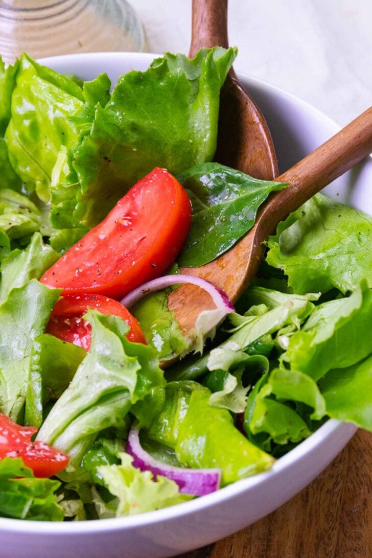 Everyday Green Salad is fresh, easy to make, with tomatoes, lettuce and onion. It's the best recipe that's simple and delicious.