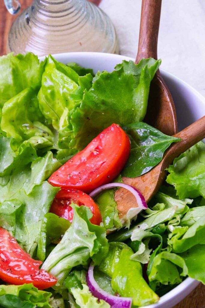 Everyday Green Salad is fresh, easy to make, with tomatoes, lettuce and onion. It's the best recipe that's simple and delicious.