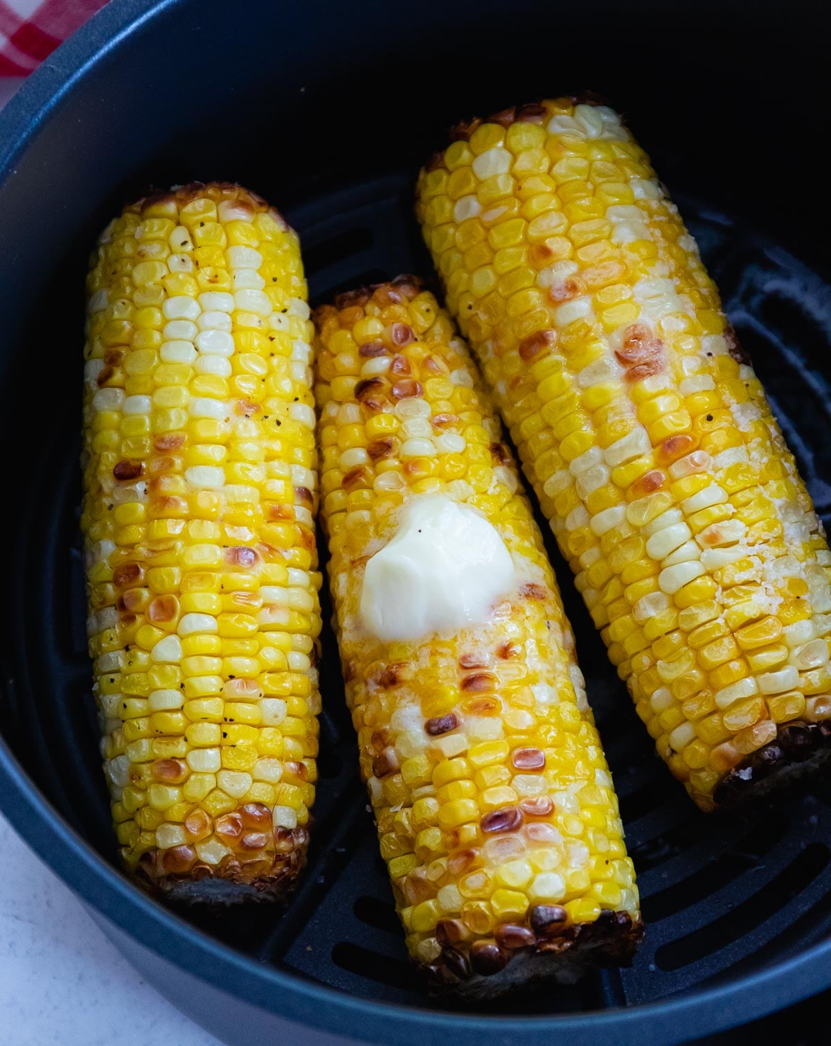 Air Fryer Corn On The Cob is perfectly cooked and delicious.