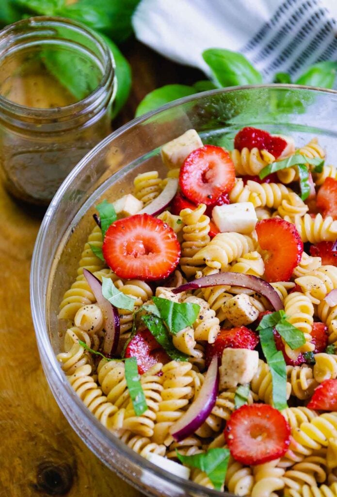 Strawberry Caprese Pasta Salad made with fresh ingredients is the perfect summer salad to serve at any family gathering or as a side dish for grilled meats and fish.