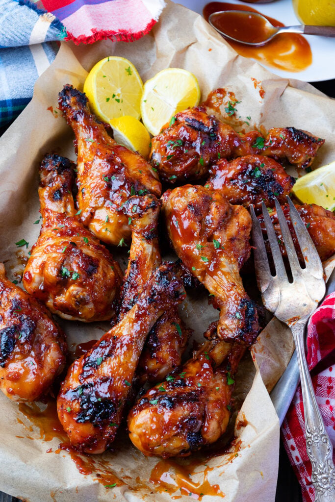Chicken Legs With Fork Overhead from Homemade BBQ Sauce (Easy And Delicious) recipe