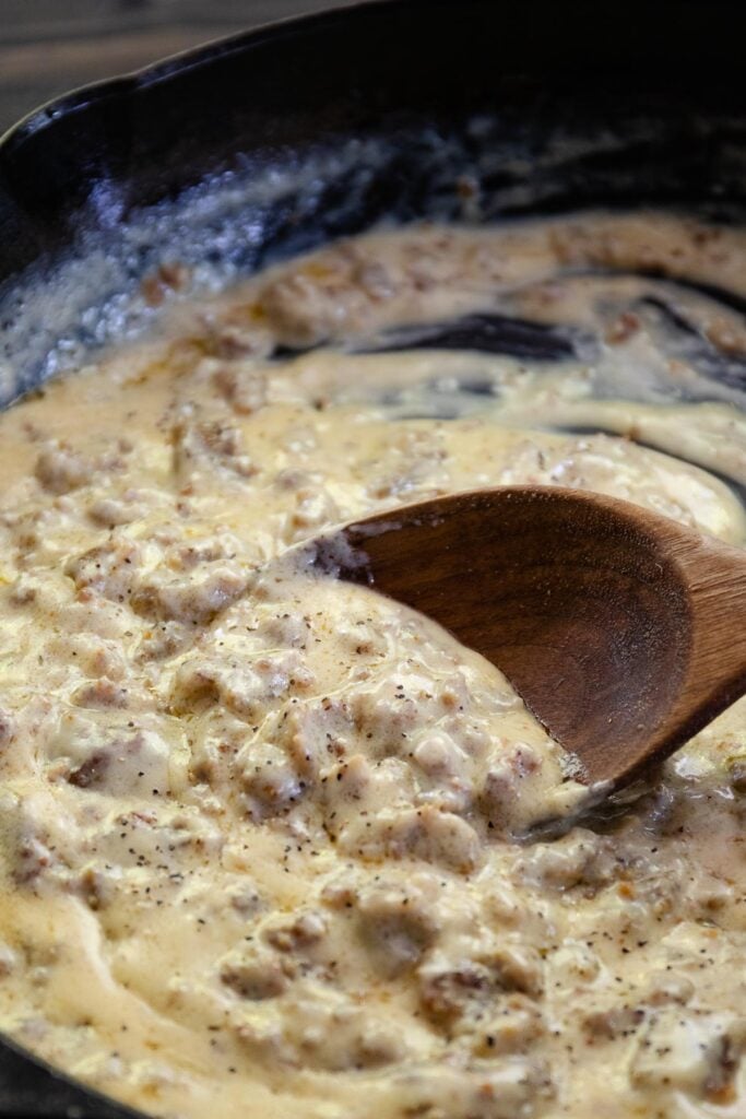 Homemade Sausage Gravy served over hot biscuits is a breakfast made in heaven. Made with only 3 ingredients, this classic recipe is delicious, filling, and a time-honored tradition.