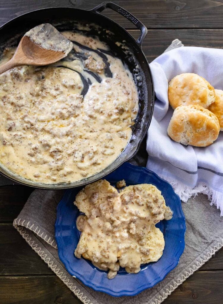 Homemade Sausage Gravy served over hot biscuits is a breakfast made in heaven. Made with only 3 ingredients, this classic recipe is delicious, filling, and a time-honored tradition.