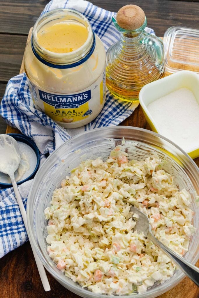 Creamy coleslaw for a side dish, hot dogs, hamburgers is great for serving at cookouts.
