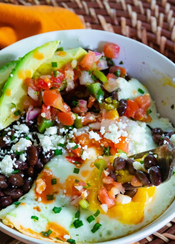 Black Bean Breakfast Burrito Bowls scooped up with a fork is a healthy, delcious way to start the day!