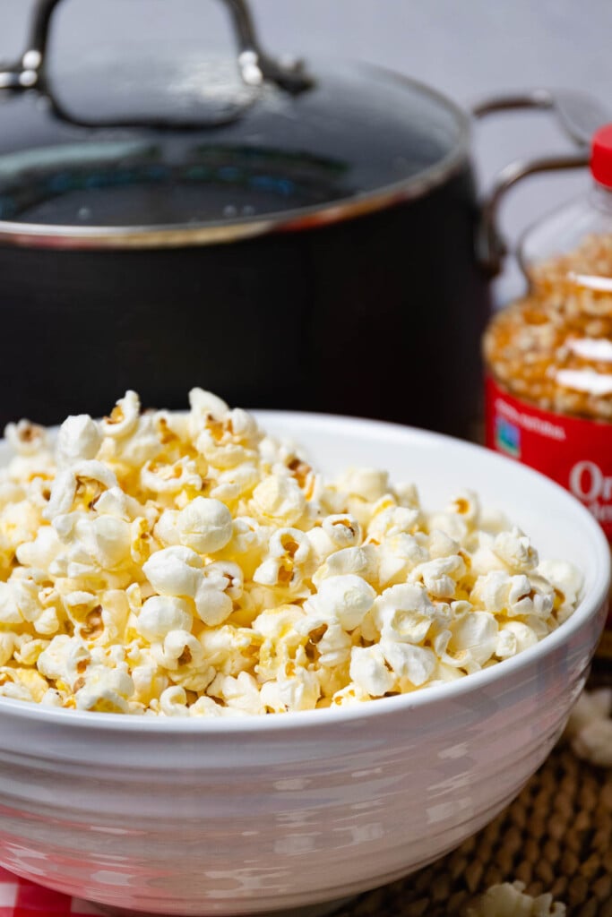 Stovetop popcorn freshly popped sitting in a bowl.