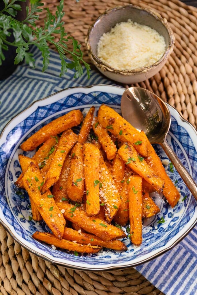 Air Fryer Carrots seasoned with garlic powder, salt, pepper and parmesan cheese are simple to make and are a perfect side dish.