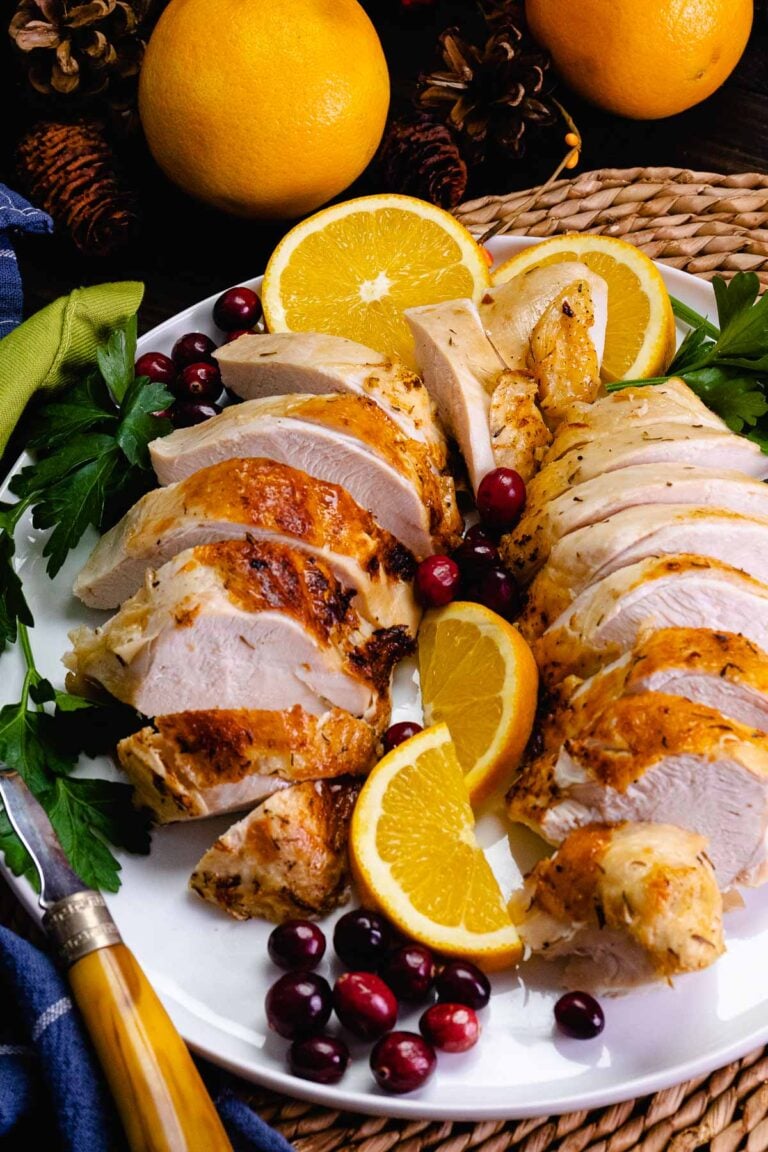 Juicy, tender turkey breast cooked in the crock pot, sliced and ready to serve for Thanksgiving.