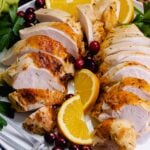 Juicy, tender turkey breast cooked in the crock pot, sliced and ready to serve for Thanksgiving.