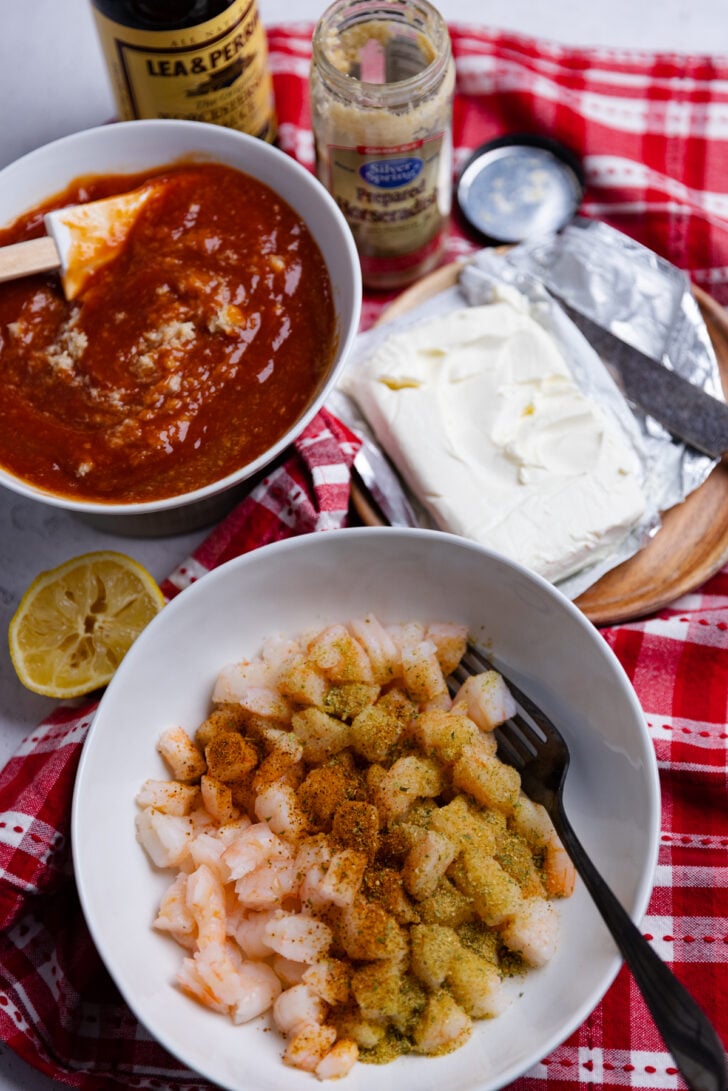Layered Shrimp Dip with cream cheese and homemade cocktail sauce is a delicious, easy-make appetizer perfect for any party of spur of the moment gathering.