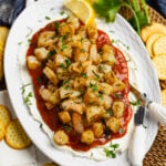 Layered Shrimp Dip with cream cheese and homemade cocktail sauce is a delicious, easy-make appetizer perfect for any party of spur of the moment gathering.