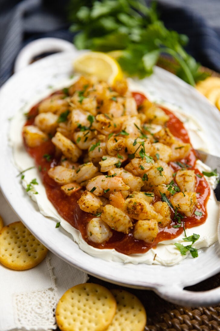 Layered Shrimp Dip with cream cheese and homemade cocktail sauce is a delicious, easy-make appetizer perfect for any party of spur of the moment gathering.