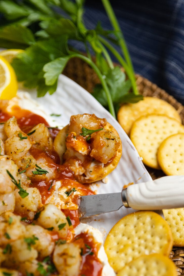 Layered Shrimp Dip with cream cheese and homemade cocktail sauce is a delicious, easy-make appetizer perfect for any party of spur of the moment gathering.