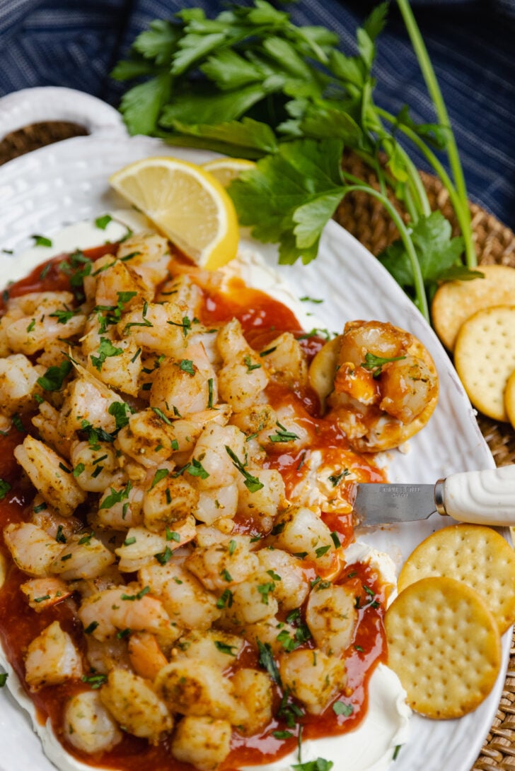 Layered Shrimp Dip with cream cheese and homemade cocktail sauce is a delicious, easy-make appetizer perfect for any party of spur of the moment gathering.