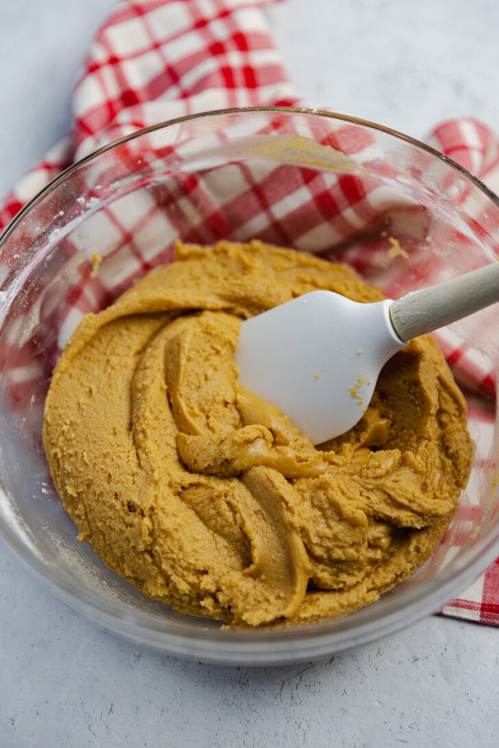Homemade Peanut Butter Fudge made in the microwave with just 4 ingredients in about 10 minutes is smooth, buttery and full of amazing peanut butter flavor!