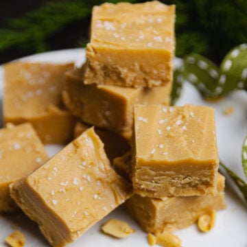 Homemade Peanut Butter Fudge made in the microwave with just 4 ingredients in about 10 minutes is smooth, buttery and full of amazing peanut butter flavor!