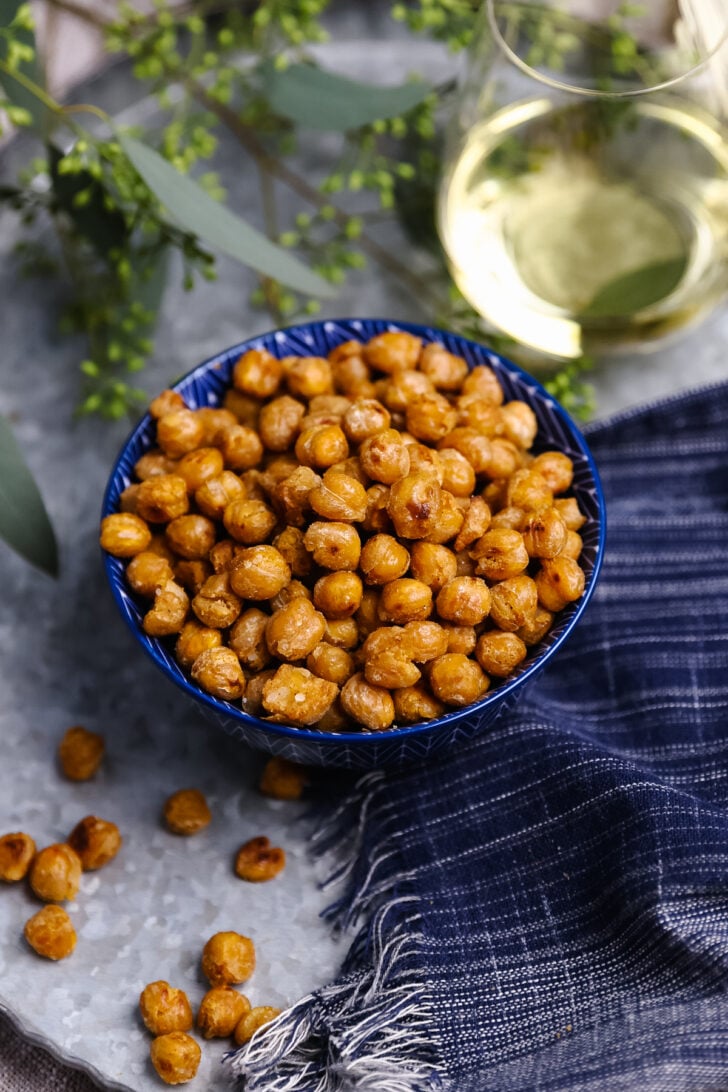Skillet Roasted Chickpeas are easy to make, seasoned with salt and pepper and loaded with protein, making them a delicious snack or addition to soups and salads.