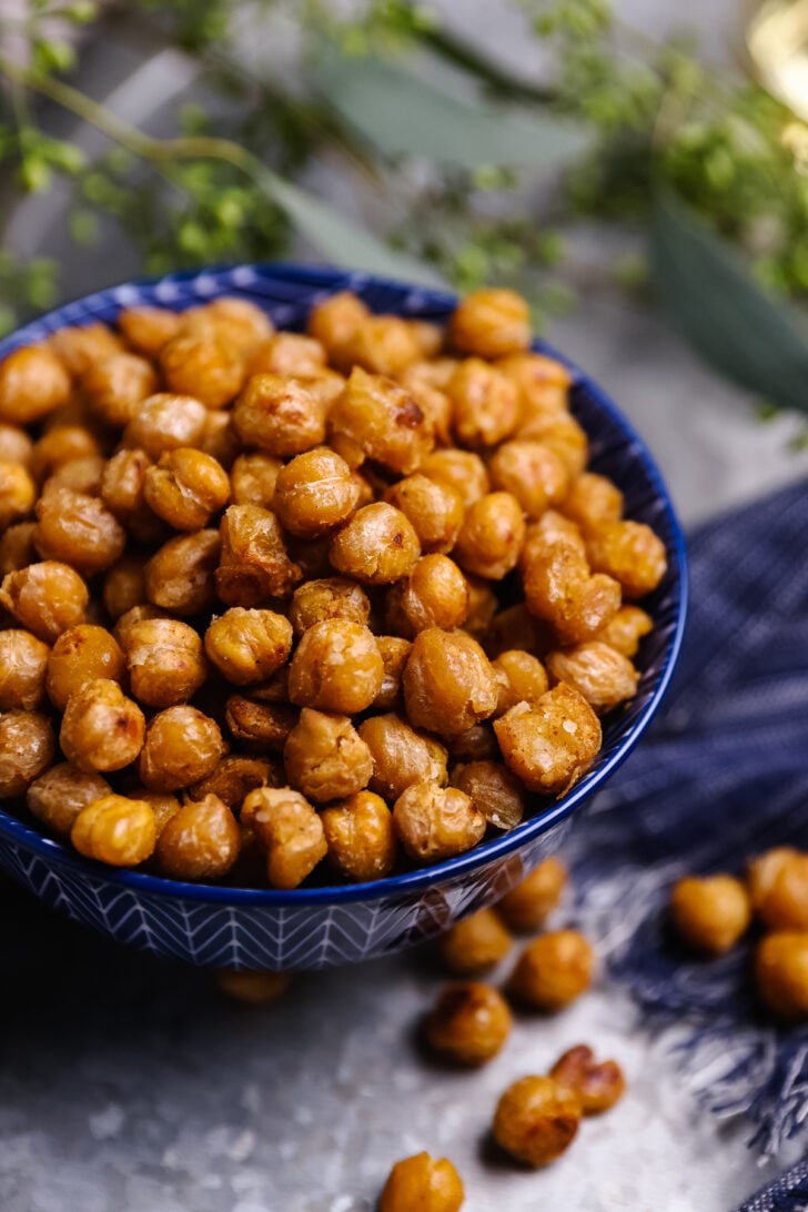 Skillet Roasted Chickpeas are easy to make, seasoned with salt and pepper and loaded with protein, making them a delicious snack or addition to soups and salads.