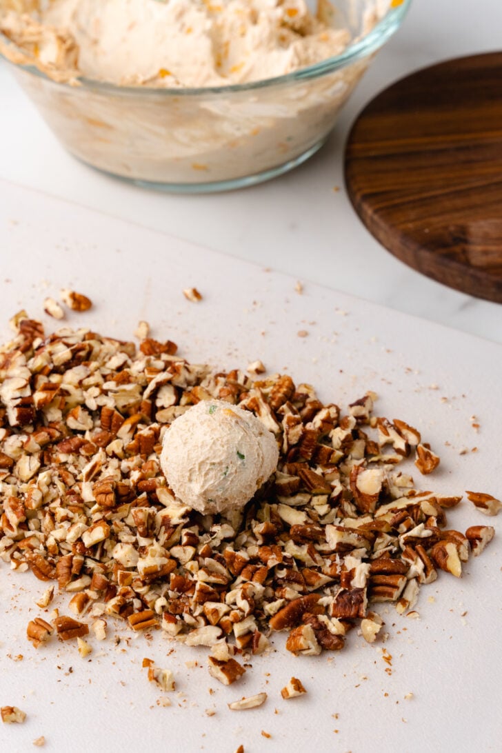 Mini Cheese Balls are easy to make with cream cheese, chopped pecans and seasoning. They are the perfect little bite for any party, celebrations and the holidays.