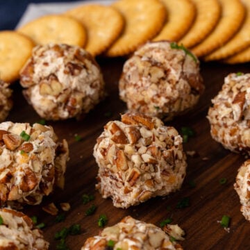 Mini Cheese Balls are easy to make with cream cheese, chopped pecans and seasoning. They are the perfect little bite for any party, celebrations and the holidays.
