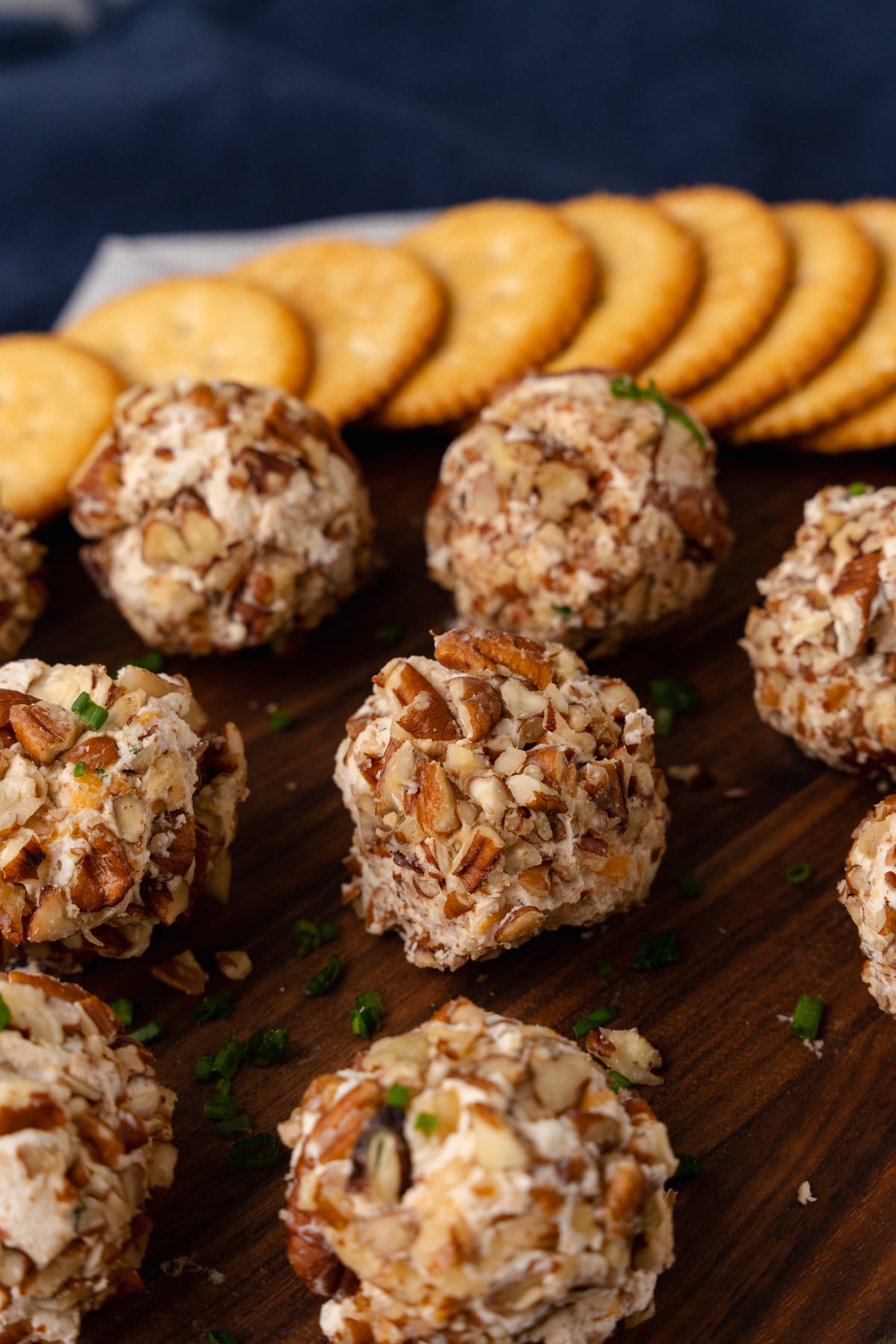 Mini Cheese Balls are easy to make with cream cheese, chopped pecans and seasoning. They are the perfect little bite for any party, celebrations and the holidays.