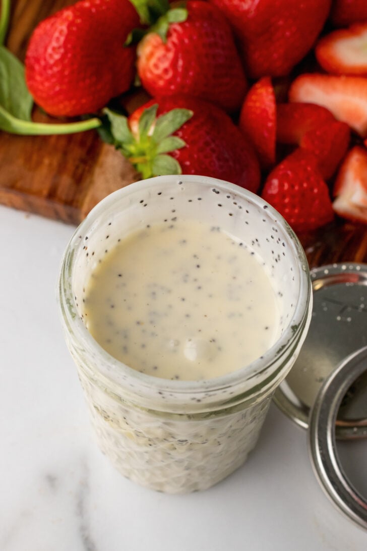 Spinach Strawberry Salad with a creamy homemade dressing is fresh, easy to make and perfect to serve any time of the year. Add candies pecans for a sweet crunch!