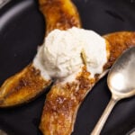 Air Fryer Bananas are caramelized with brown sugar and served with vanilla ice cream for a delicious dessert or treat that's easy to make in less than 10 minutes.
