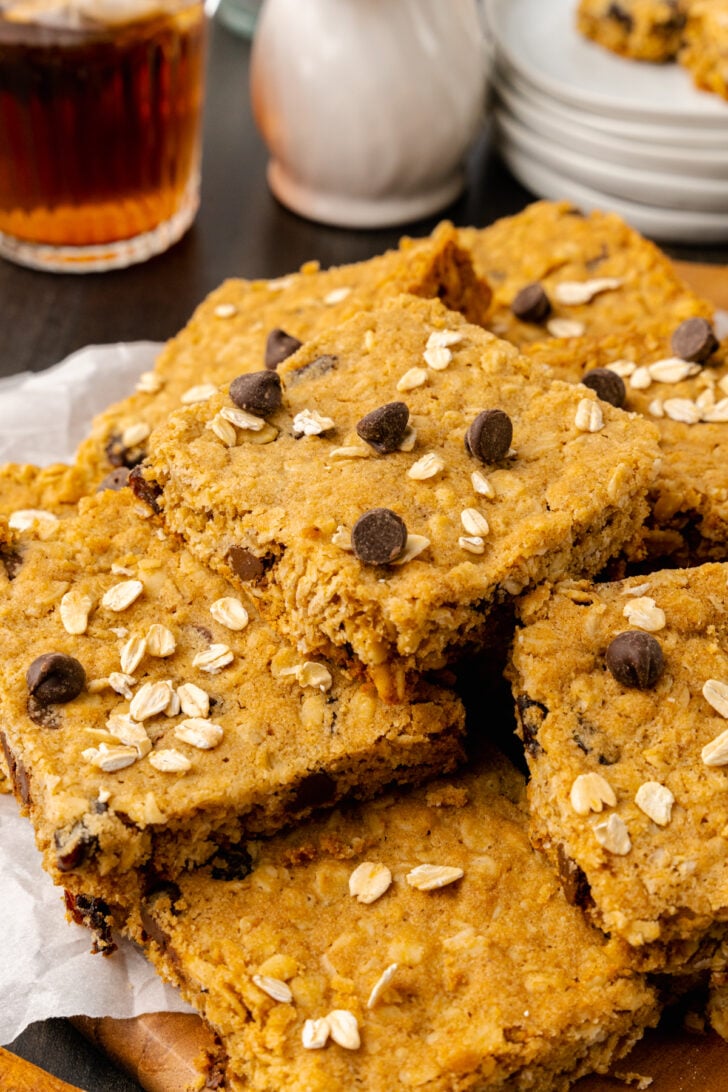 Oatmeal Chocolate Chip Cookie Bars are a cross between a soft, moist, chewy oatmeal cookie and your favorite chocolate chip cookie! This simple recipe combines the classic flavors of oatmeal and chocolate into a convenient bar.