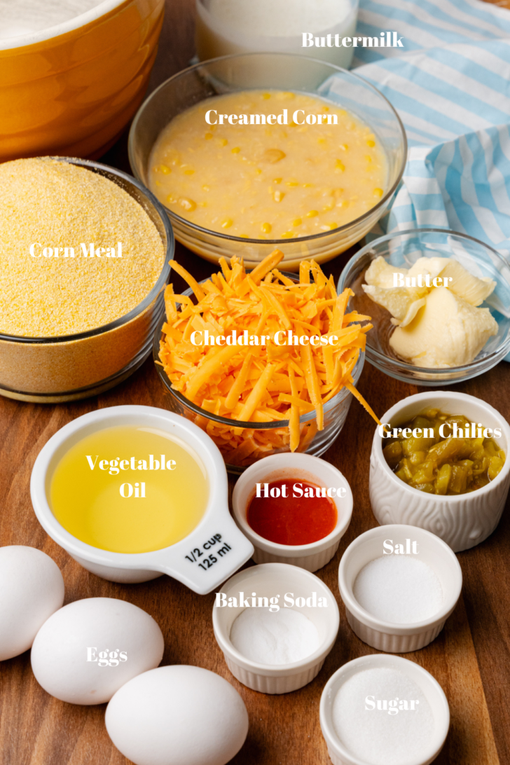 Buttermilk, creamed corn, corn meal, cheddar cheese, butter, green chilies, vegetable oil, hot sauce, eggs, baking soda, salt and sugar for cornbread.