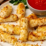 Crispy baked cheese-sticks with a rich marinara sauce.
