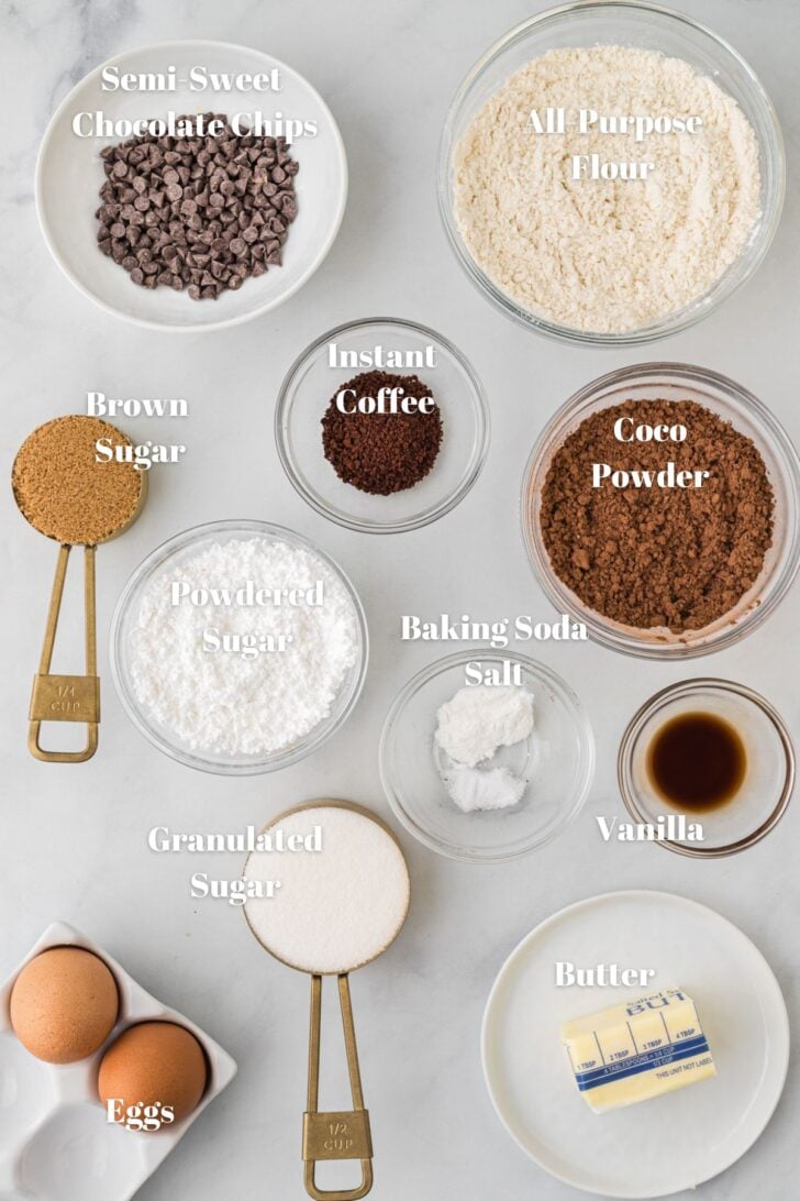 Ingredients to make crinkle cookies in nice small bowls and measuring spoons.
