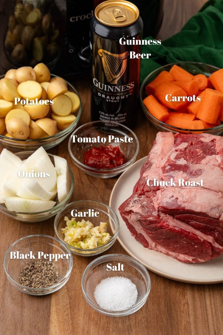 Guinness beer, potatoes, carrots, tomato paste, onions, chuck roast, garlic, black pepper, salt and a crock pot for Irish pot roast.