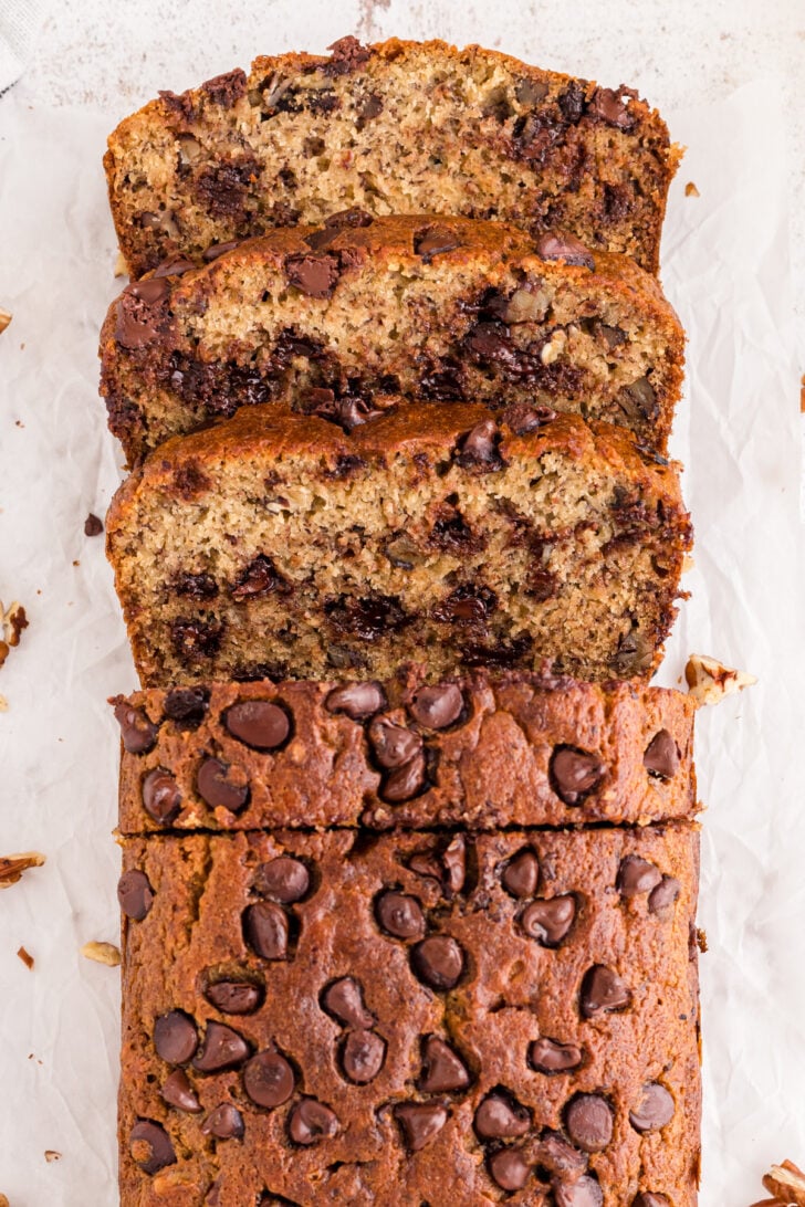 This Chocolate Chip Banana Bread is tender, super-moist, and incredibly delicious! It’s an easy-to-make recipe full of bananas and chocolate chips with an added sprinkle of pecans, making it the ideal quick bread for breakfast, brunch, an afternoon snack, or dessert.